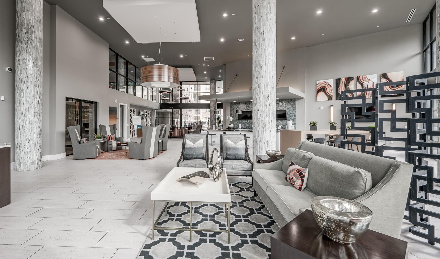 The essence of exceptional living a large room with a couch and chairs