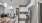 a kitchen with white cabinets