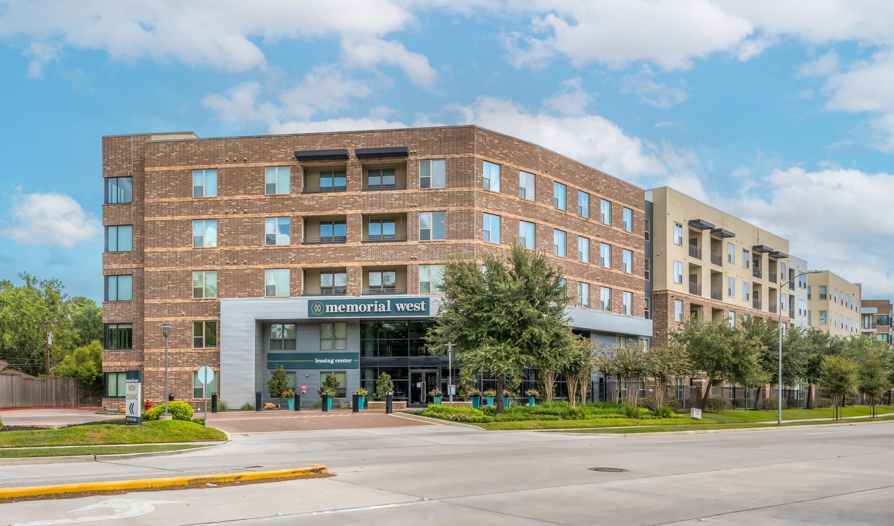 The essence of exceptional living a large building with trees in front of it