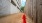 a red fire hydrant next to a building