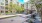 a courtyard with trees and buildings