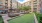 a courtyard with a pool and trees