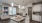 a kitchen with white cabinets